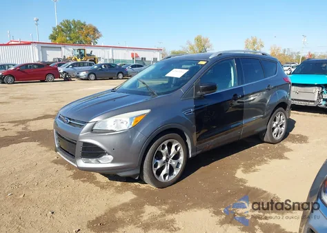 2014 Ford Escape Titanium z USA, uszkodzony, nr VIN 1FMCU9J99EUD78865